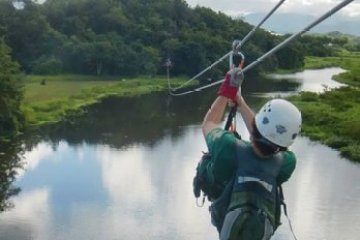 a person riding on top of a body of water
