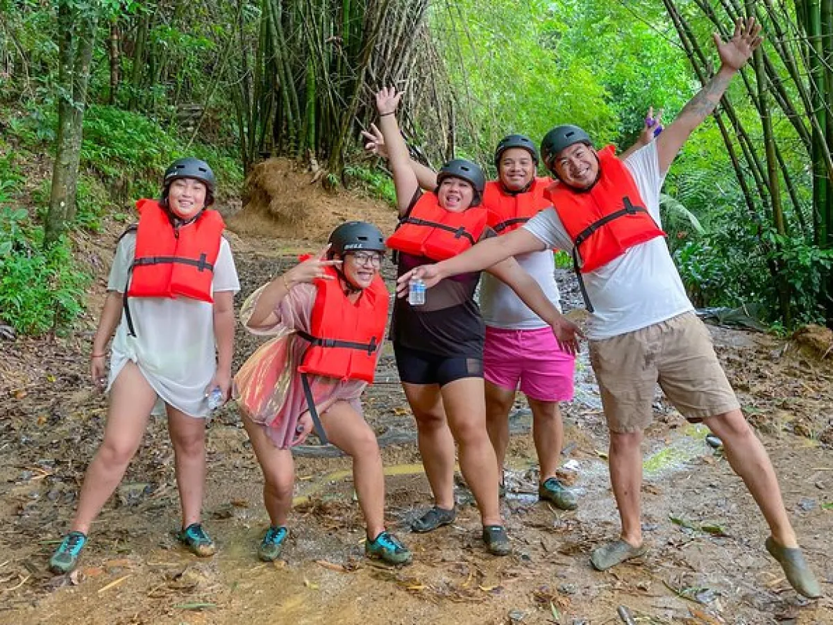 a group of people that are standing in the dirt