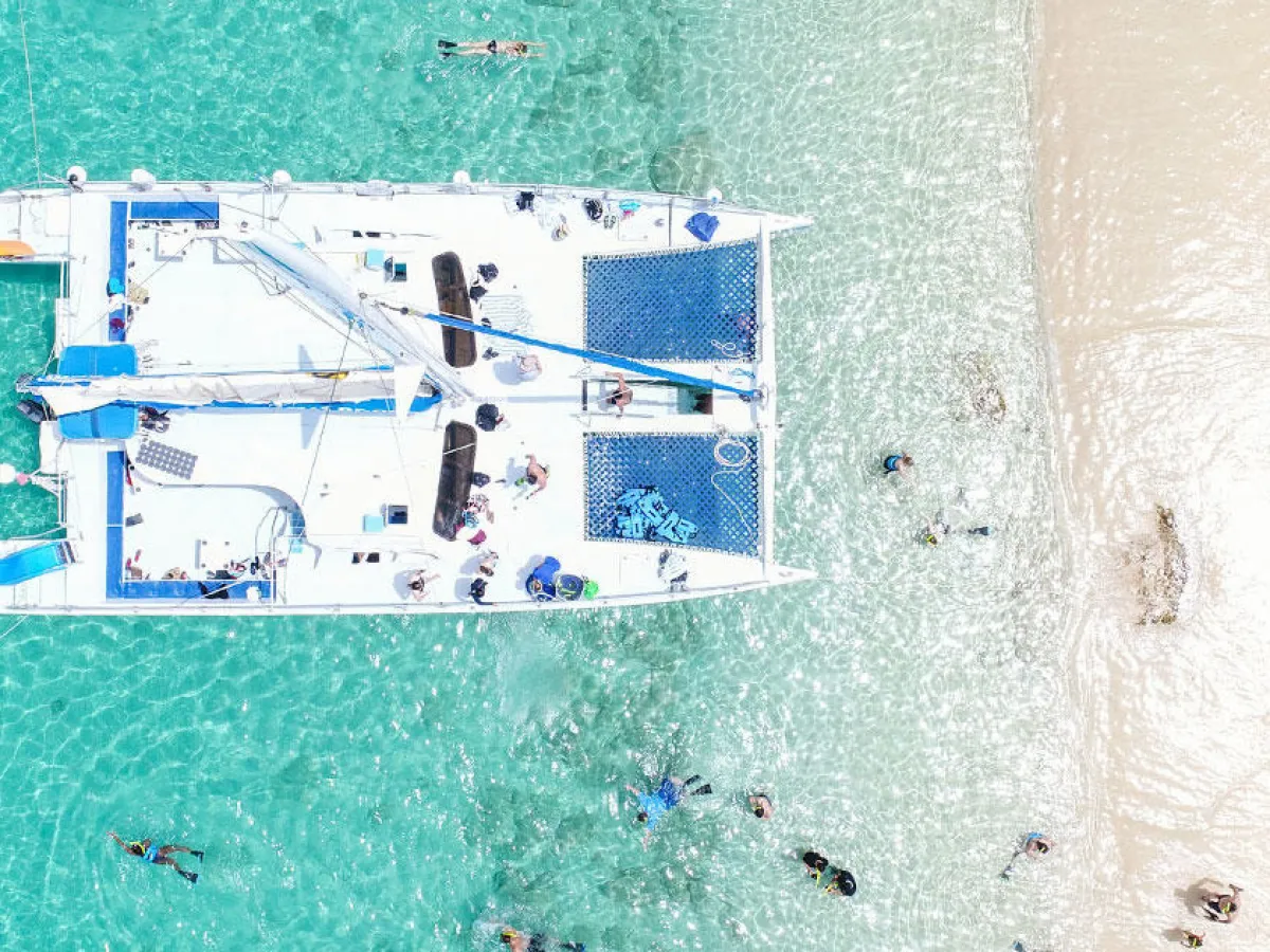 aerial view of people on a catamaran