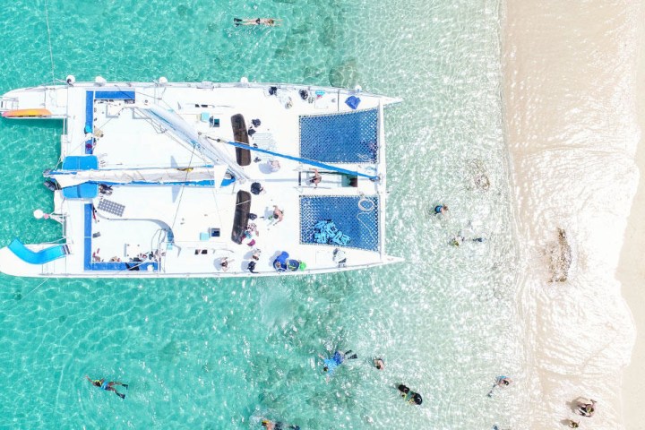 aerial view of people on a catamaran