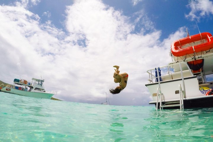 a small boat in a body of water