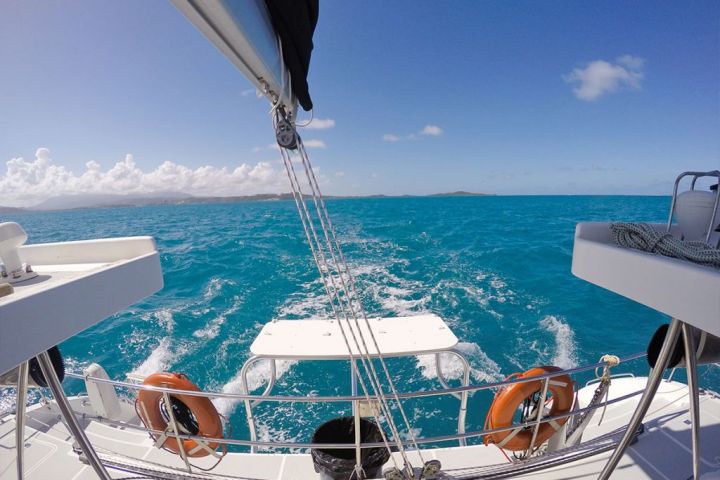 a boat sitting next to a body of water