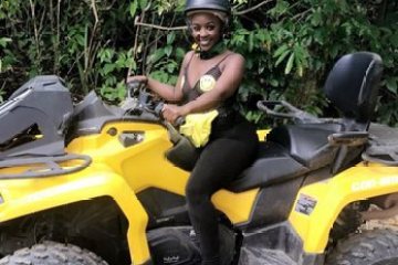 a person sitting on a motorcycle