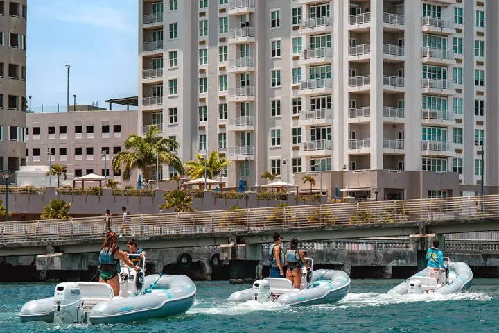 a group of people on a boat in the water