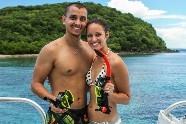 a person standing in front of a body of water