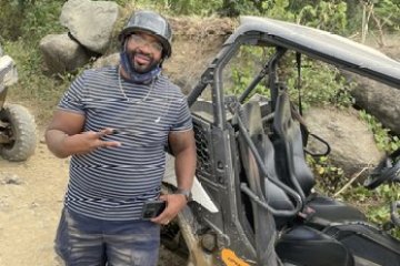 a person riding on the back of a motorcycle