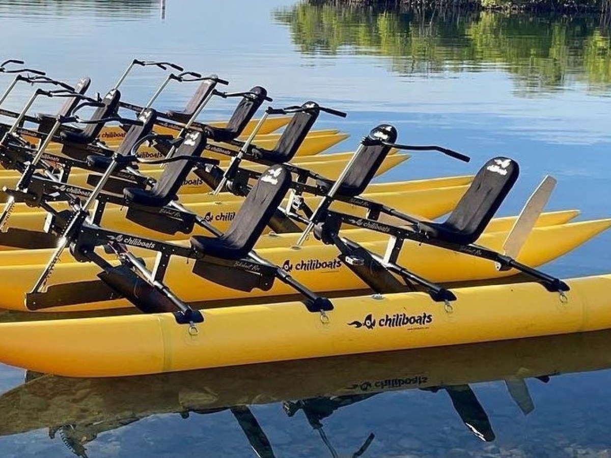 a small boat in a body of water