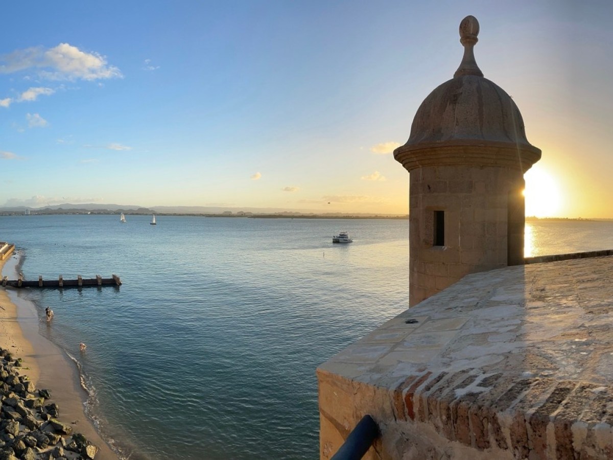 a wooden boat in a body of water