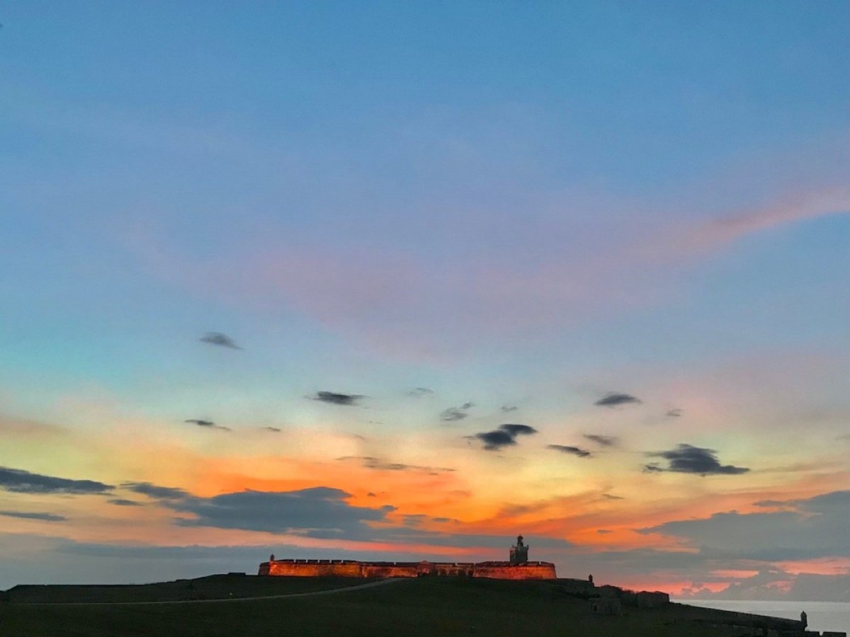 a sunset over a body of water