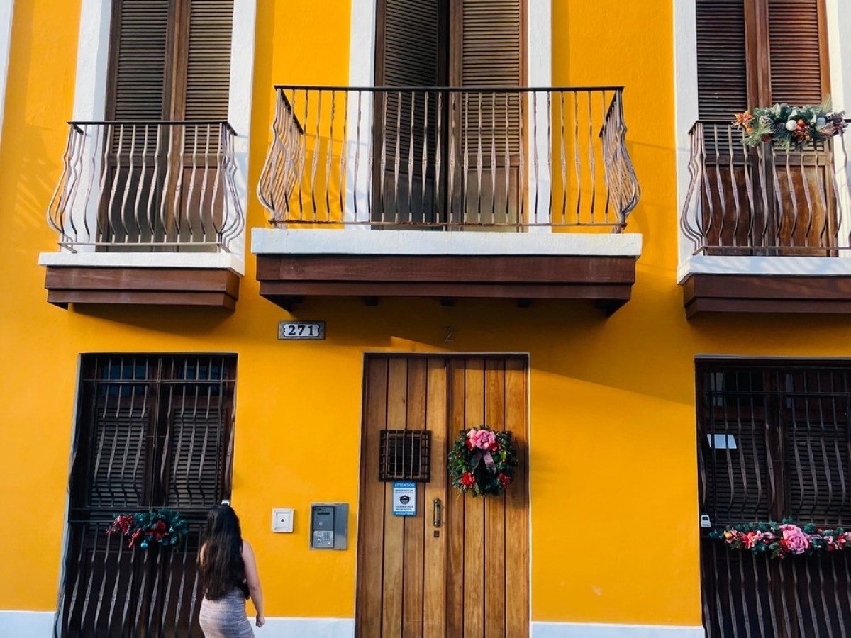 a person standing in front of a building
