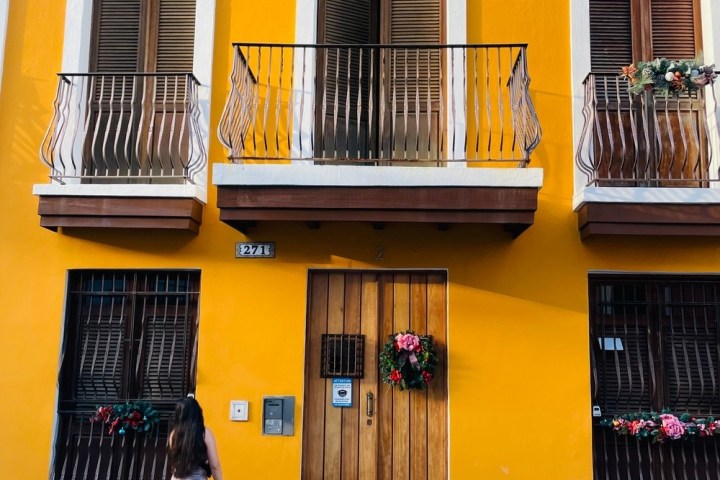 a person standing in front of a building
