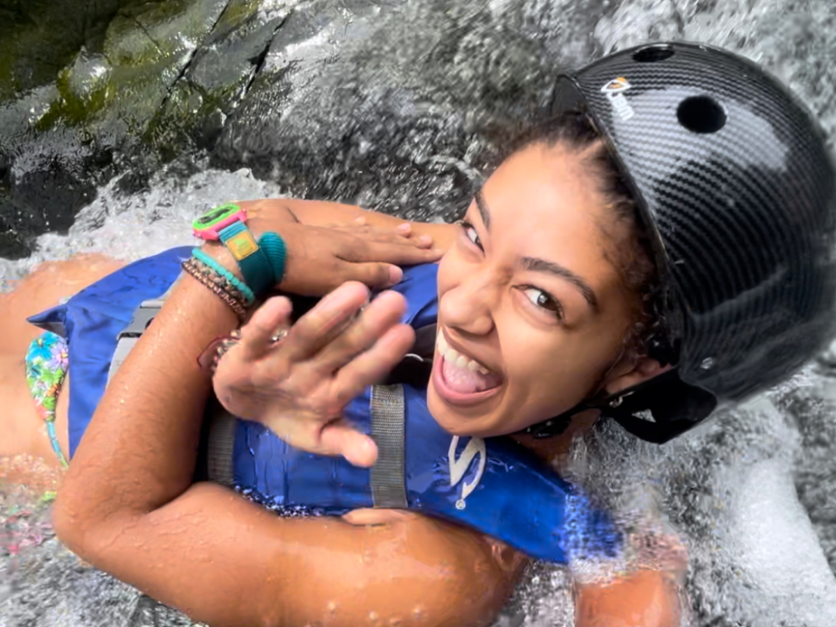 a young girl in a pool of water