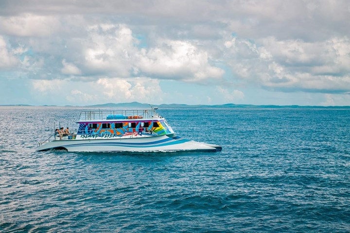 a small boat in a large body of water