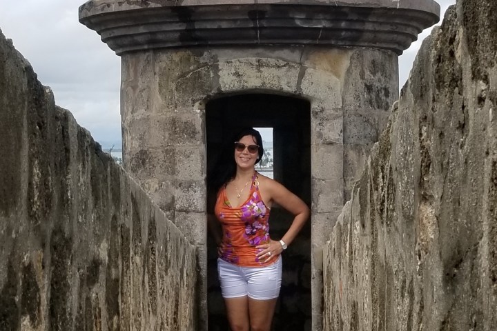 a man standing in front of a building