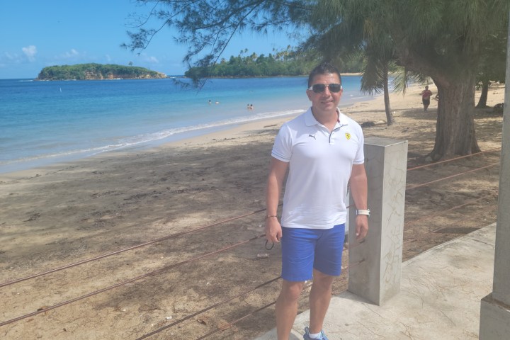 Gerardo Mejia standing on a beach