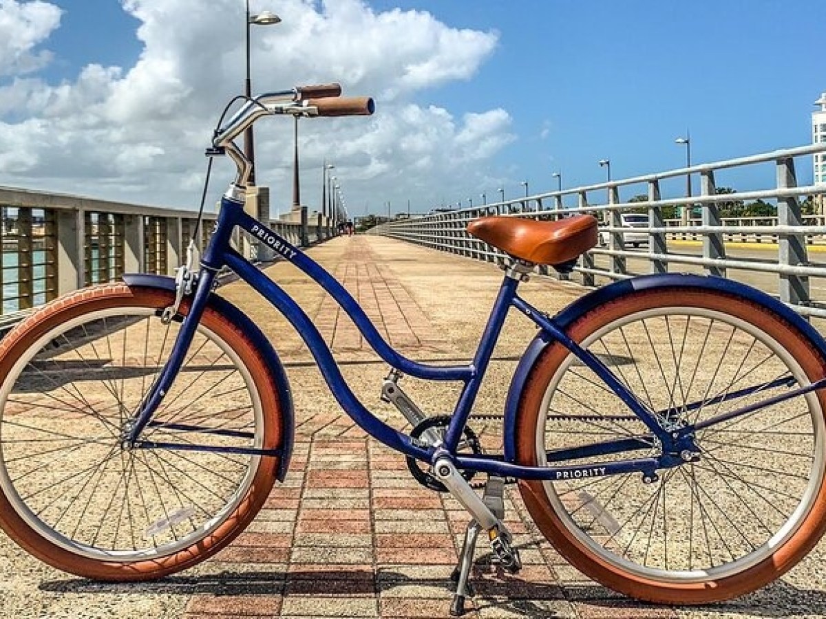 a bicycle parked on the side of the road