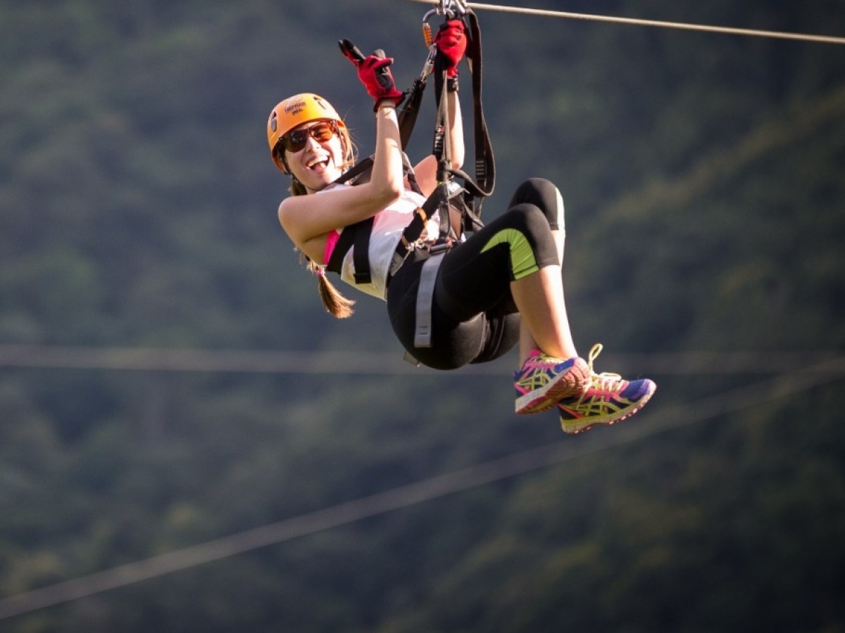 a woman jumping up in the air