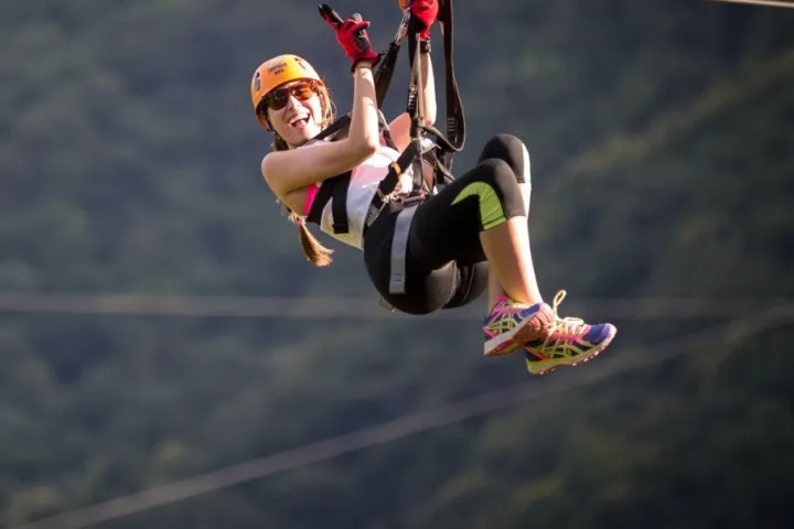 a woman jumping up in the air