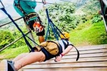 a person sitting on a wooden bench