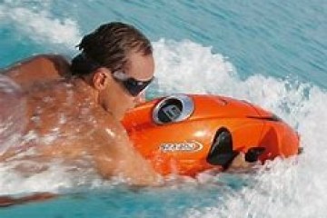 a man riding a wave on a surfboard in the water