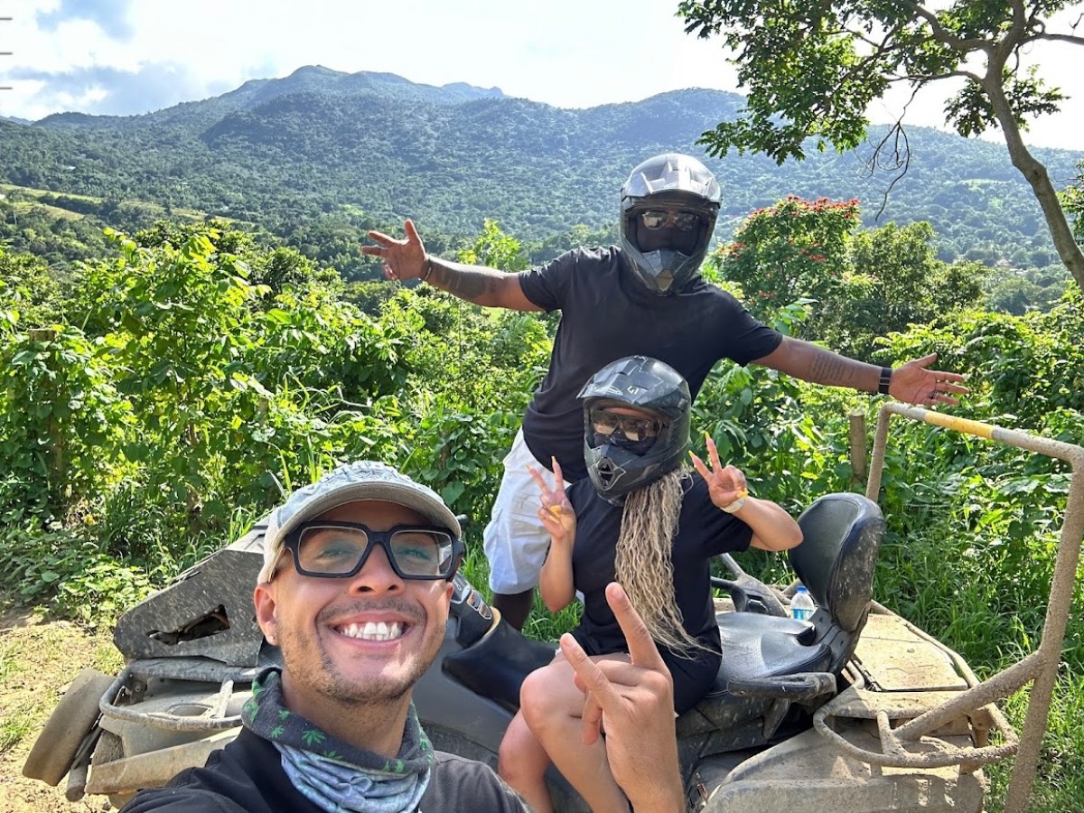 a man standing in front of a mountain