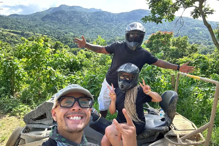 a man standing in front of a mountain