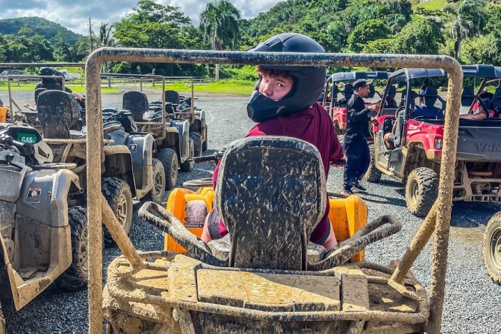 a man riding on the back of a truck