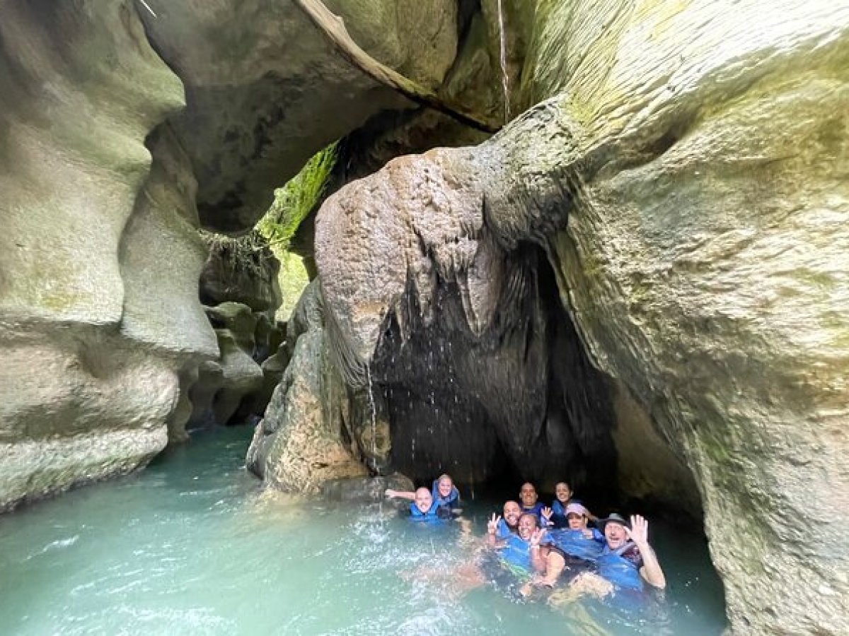 a group of people swimming in the water