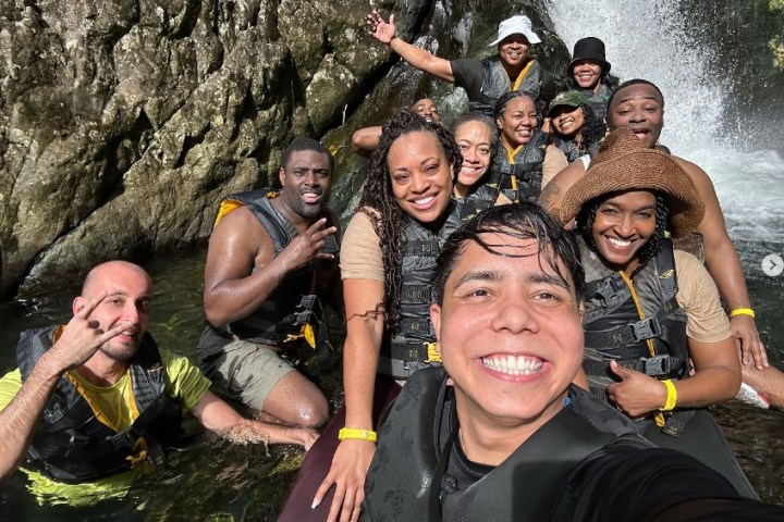 a group of people posing for the camera