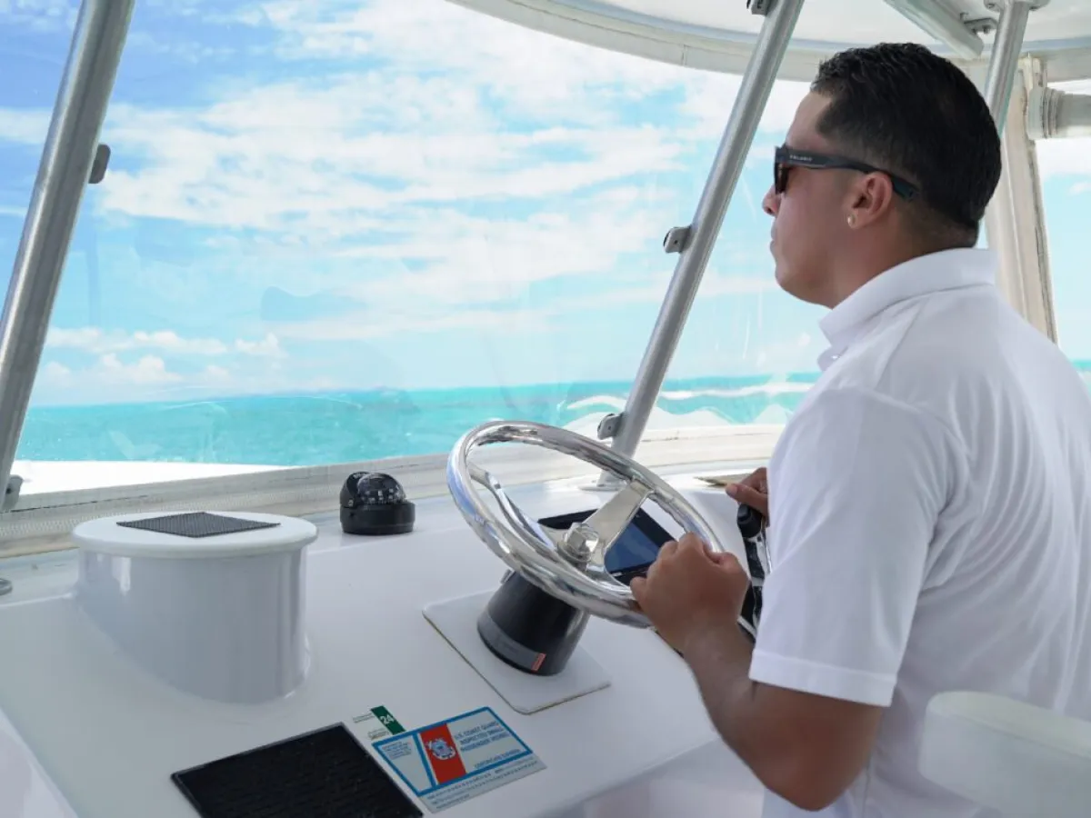 a man standing in front of a window