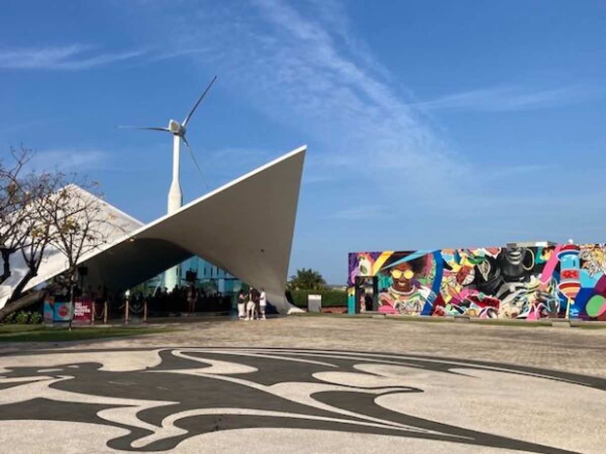 a person riding a skateboard up the side of a road