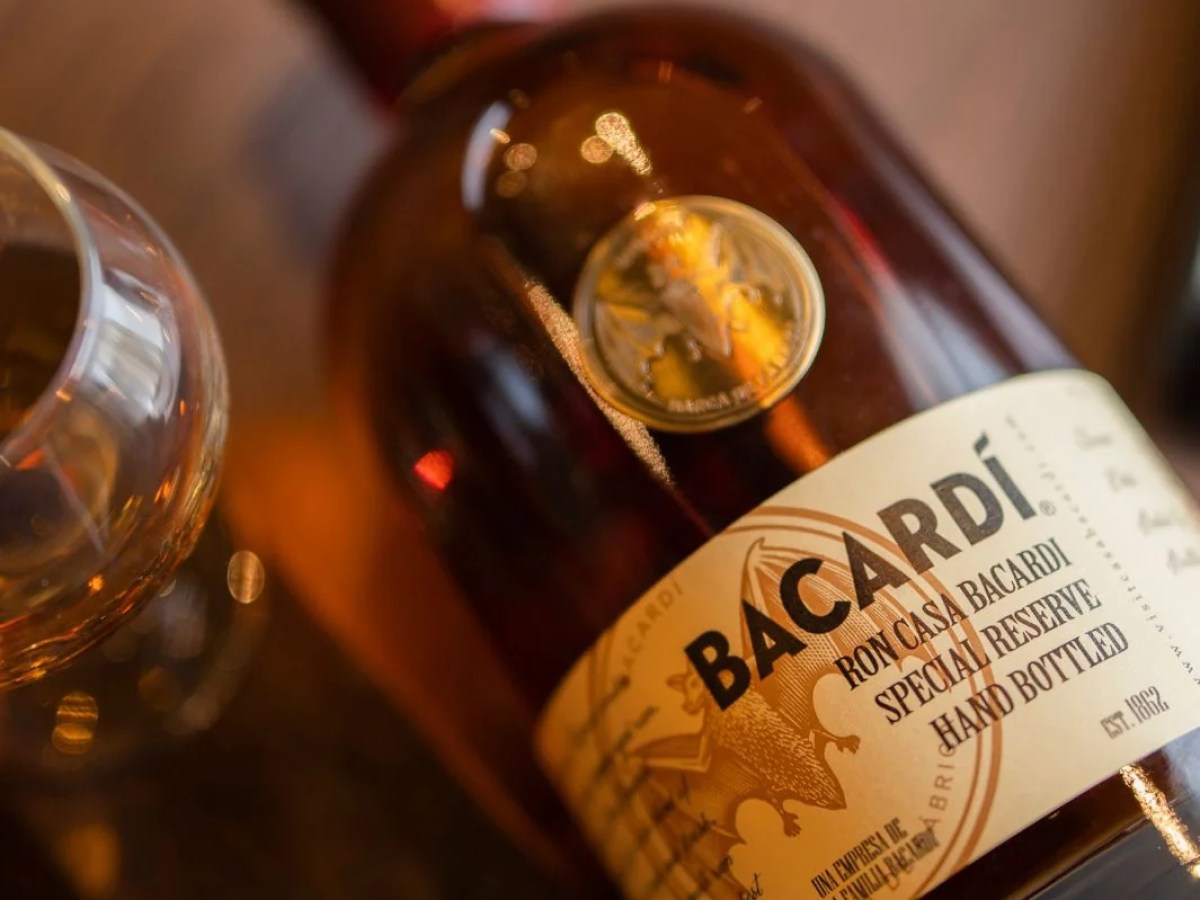 a bottle and a glass of wine