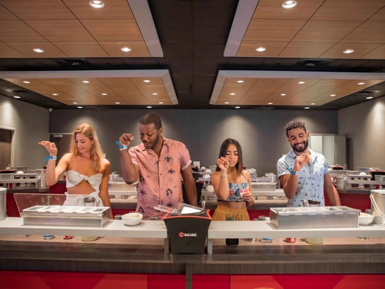 a group of people performing on a counter