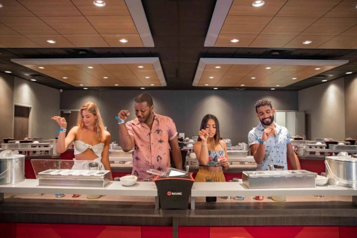 a group of people performing on a counter